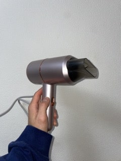 hand holding a hairdryer